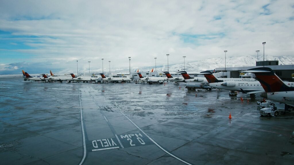 White airplanes under a blue sky